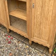 Asymmetrical Art Deco glass-fronted Parisian wardrobe in raw oak, 1930.