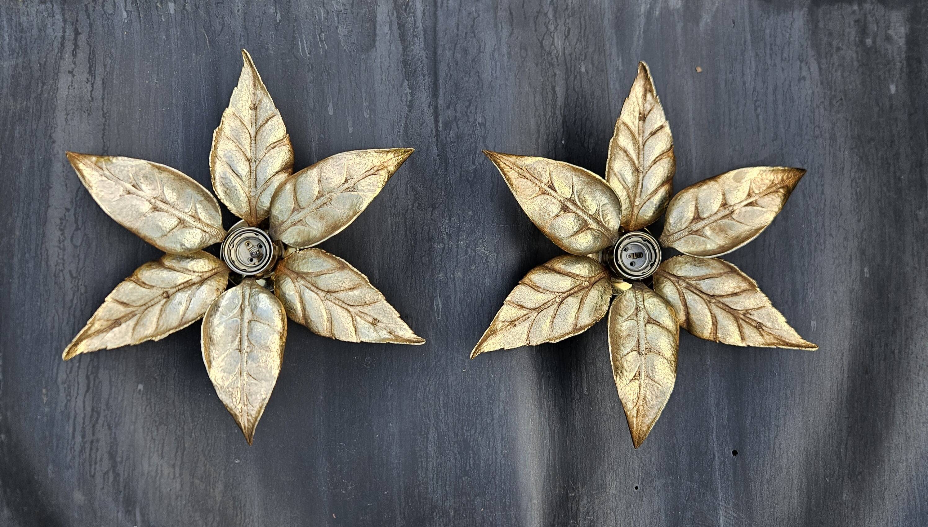 Pair of Massive wall lamps, designed by Willy Daro. 70s