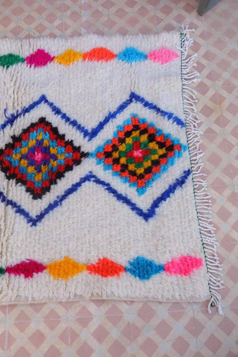 Ecru Moroccan rug with coloured patterns 250cm x 150cm