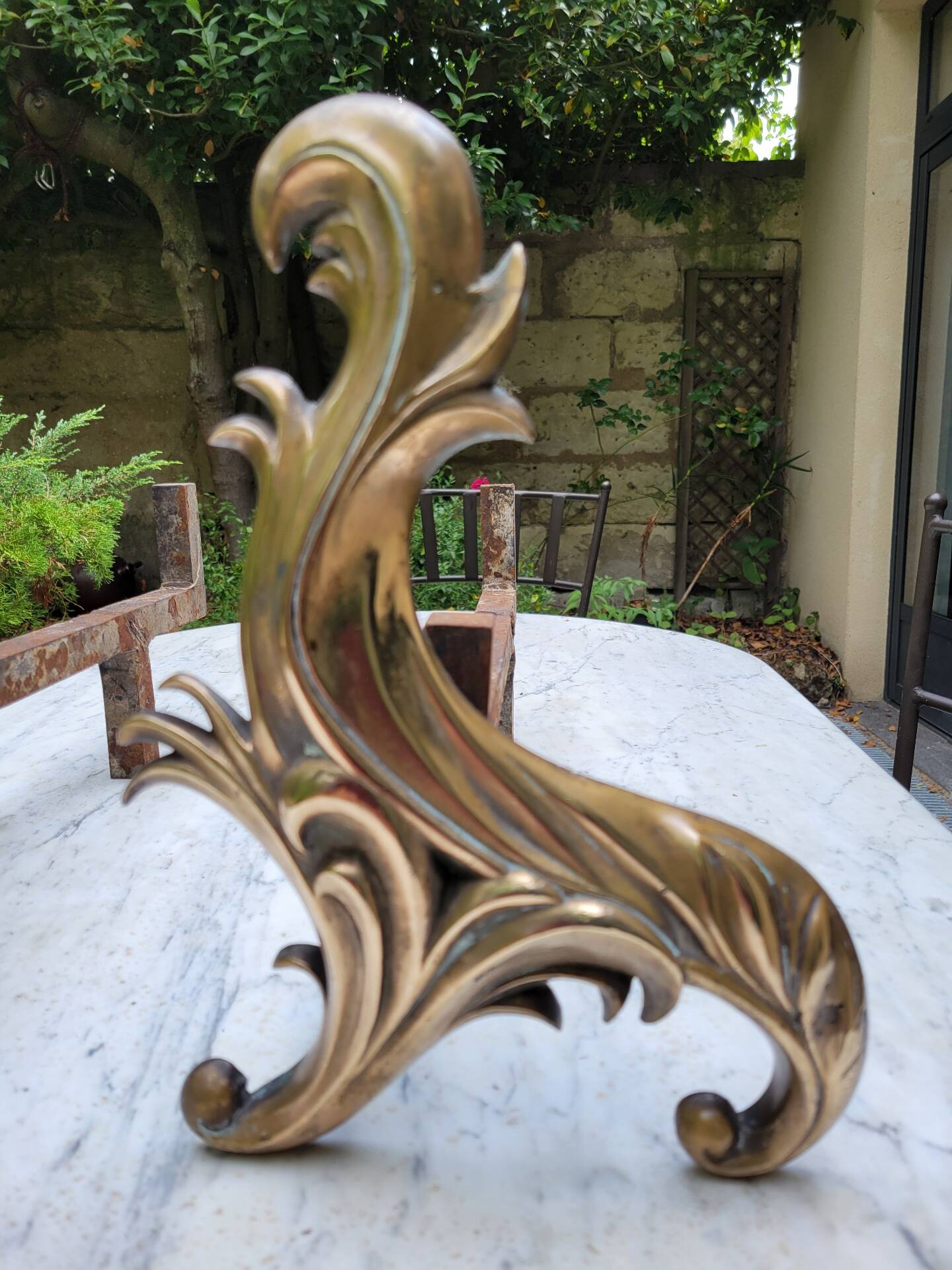 Gilded bronze chenets from the 19th century