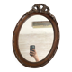 Miroir ovale mercure en bois sculpté décor nœud ruban 37X52