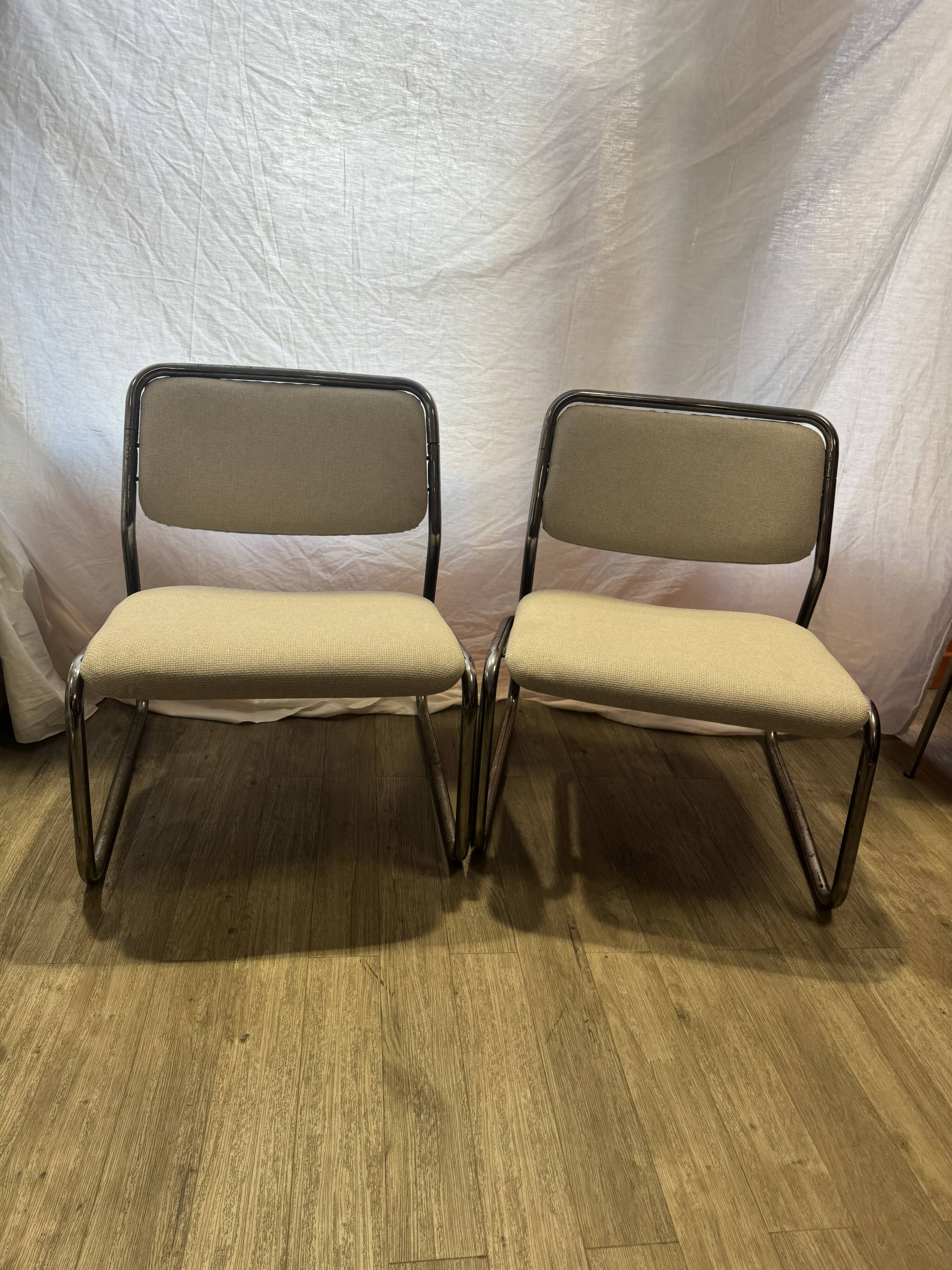 Pair of 70s tubular armchairs