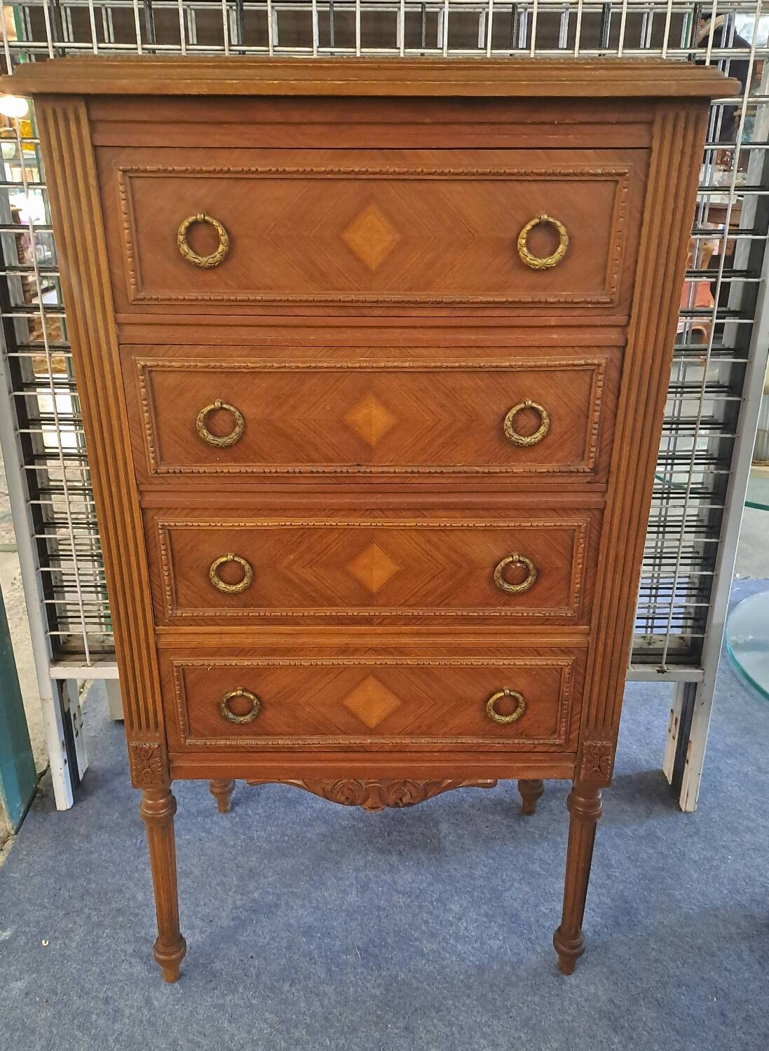 Walnut chest of drawers with 4 pink marble drawers