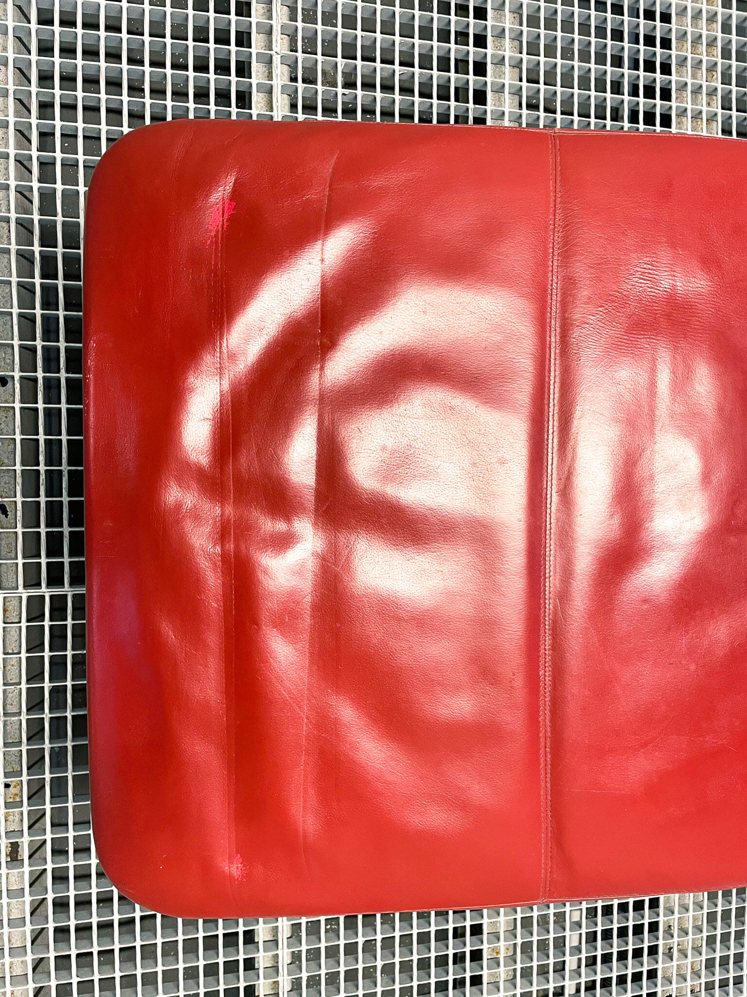 B&B Italia red leather lounge chair by Jeffrey Bernett