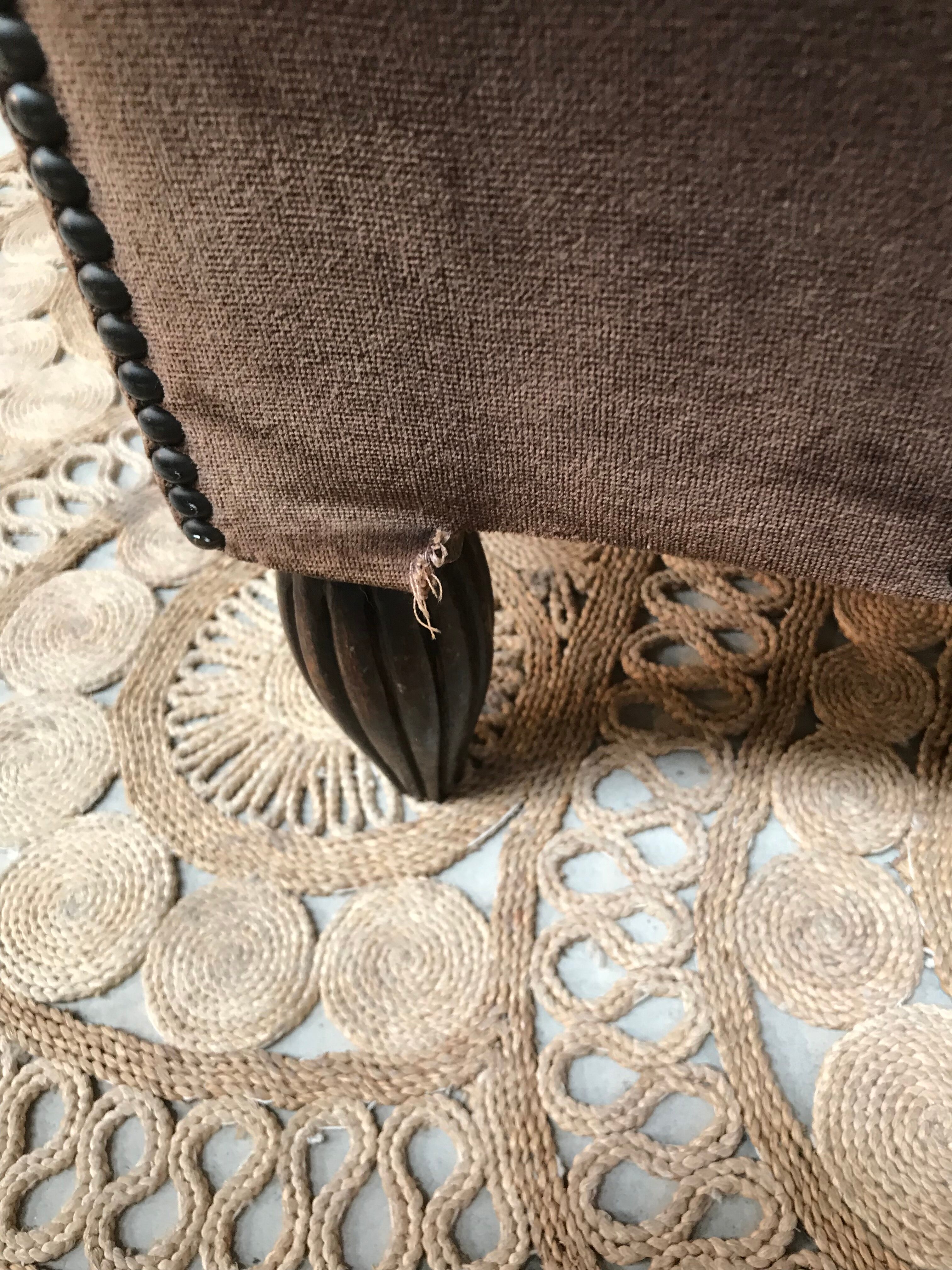 Club armchair in brown fabric