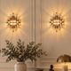Pair of Venini wall sconces in cut Murano glass, circa 1970.