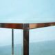 Minimalist coffee table in brass and glass, Regency style from the 1970s.