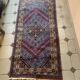 Tapis d'Orient persan ancien en laine à médaillon central