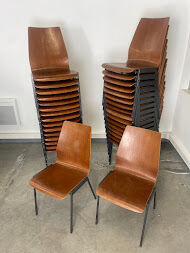 Set of 33 stackable wooden chairs 70s, origin Germany.