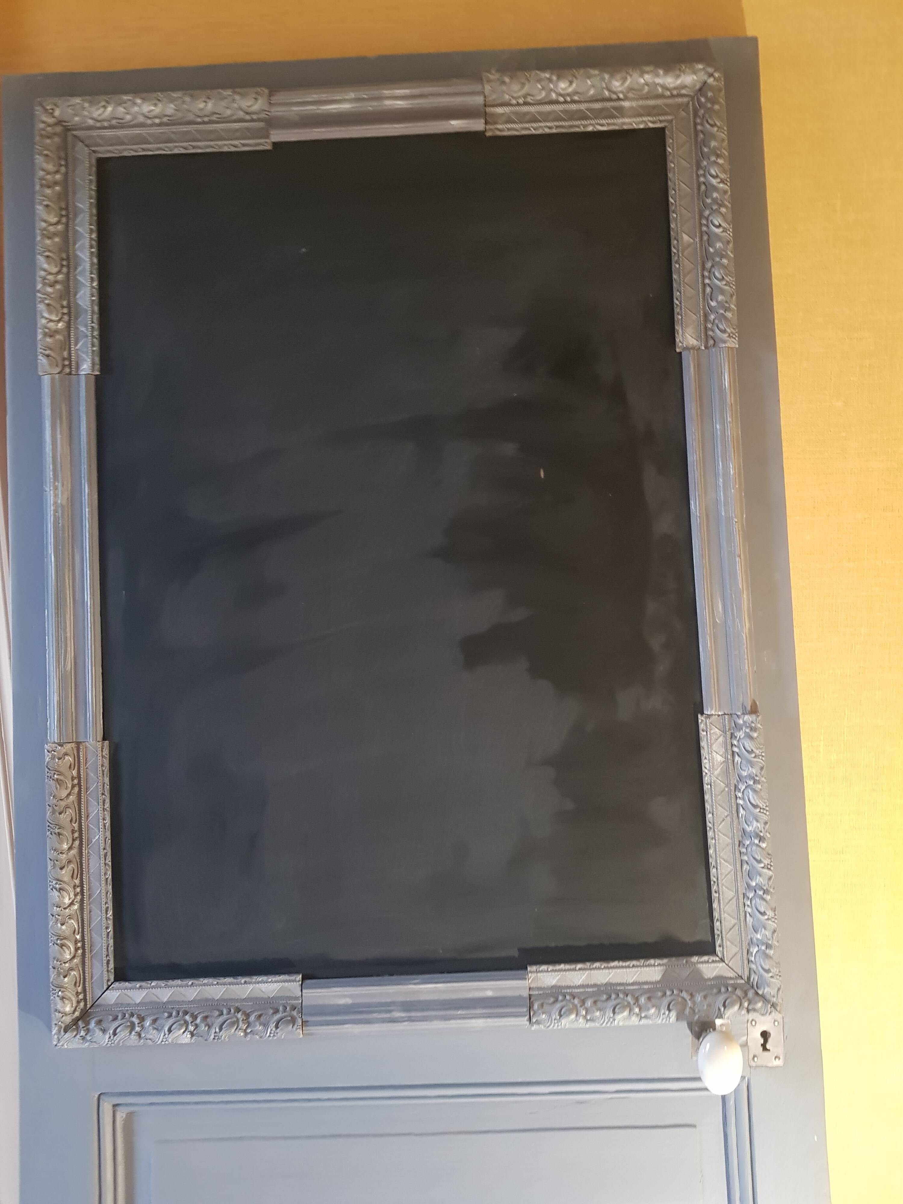 Large painted oak interior door with its hinges