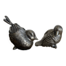 Couple d’oiseaux en métal ciselé
