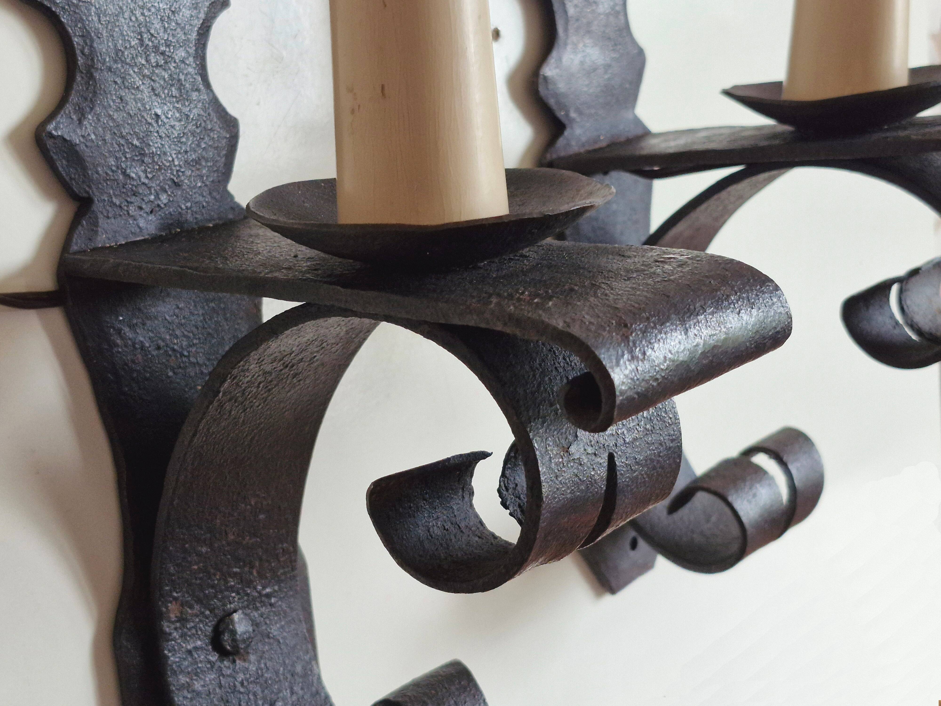 Duo of wrought iron wall lights Ateliers Marolles