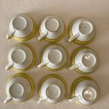 Yellow and white cups and saucers with gold trim Moulin des loups
