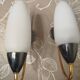 Minimalist wall sconces in opal white glass from the 1990s.