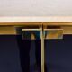 Firm brass lacquered black 1970s travertine