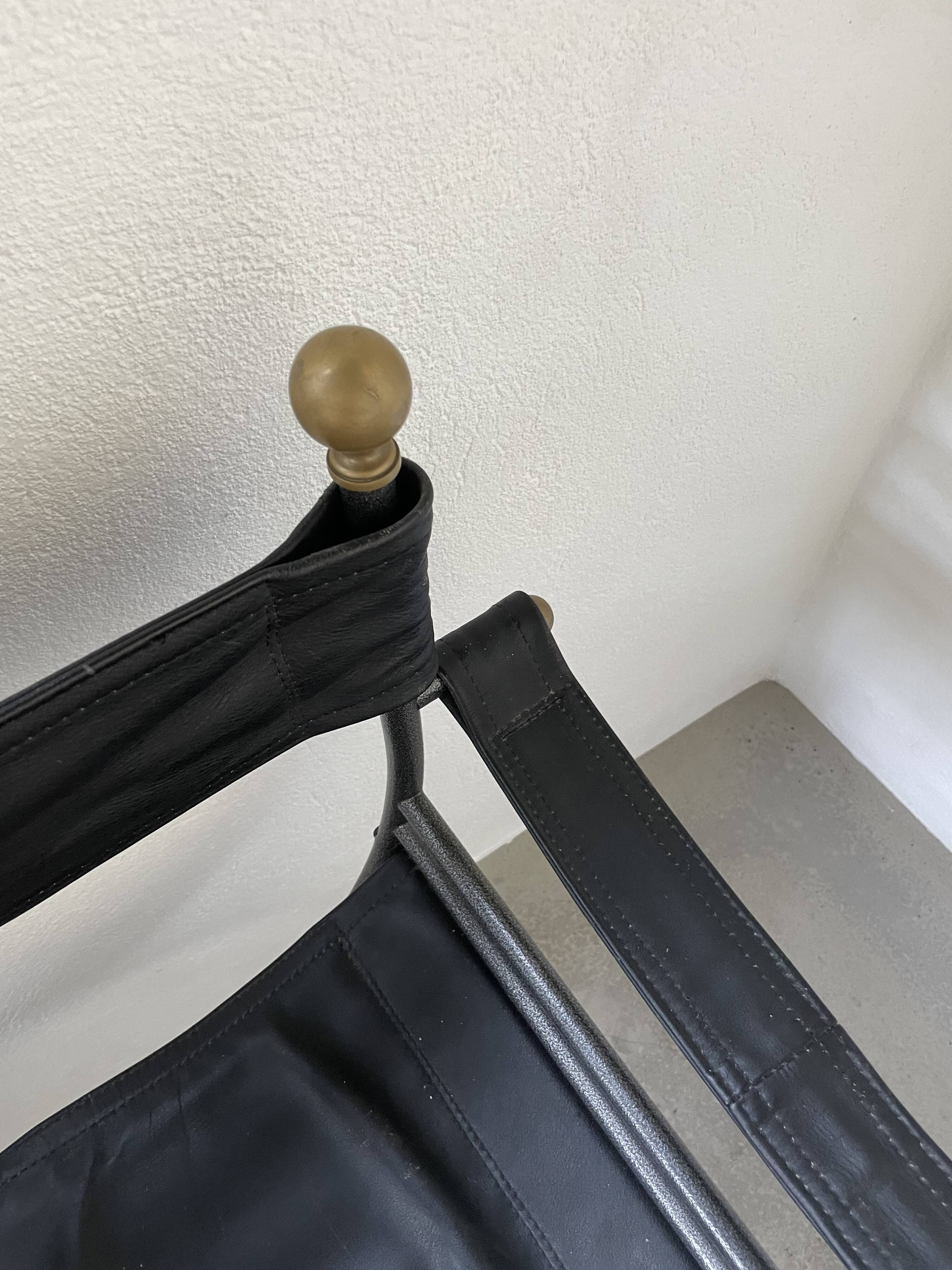 Pair of leather “curule” emperor armchairs