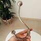 Antique steel wall-mounted coat rack