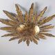 Mid-century sun ceiling lamp in gilded metal with leaf rays, 1950s