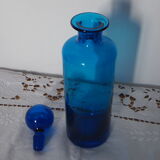 Glass bottle blue ball cap