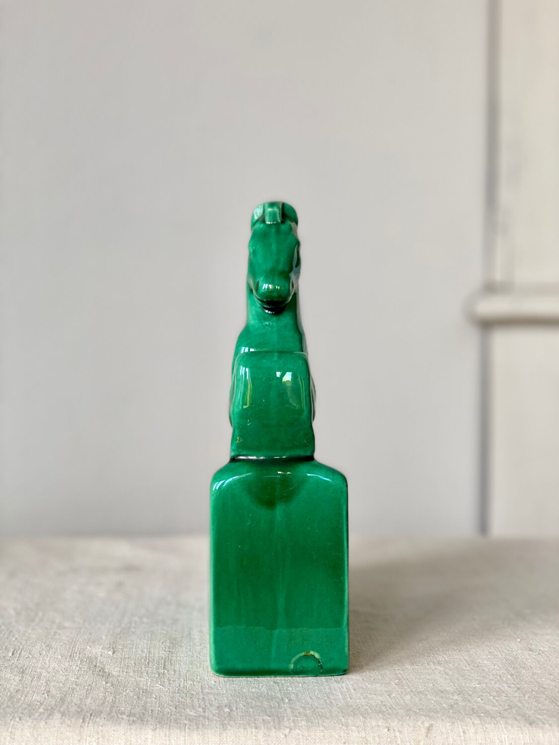 Horse bookend in green ceramic