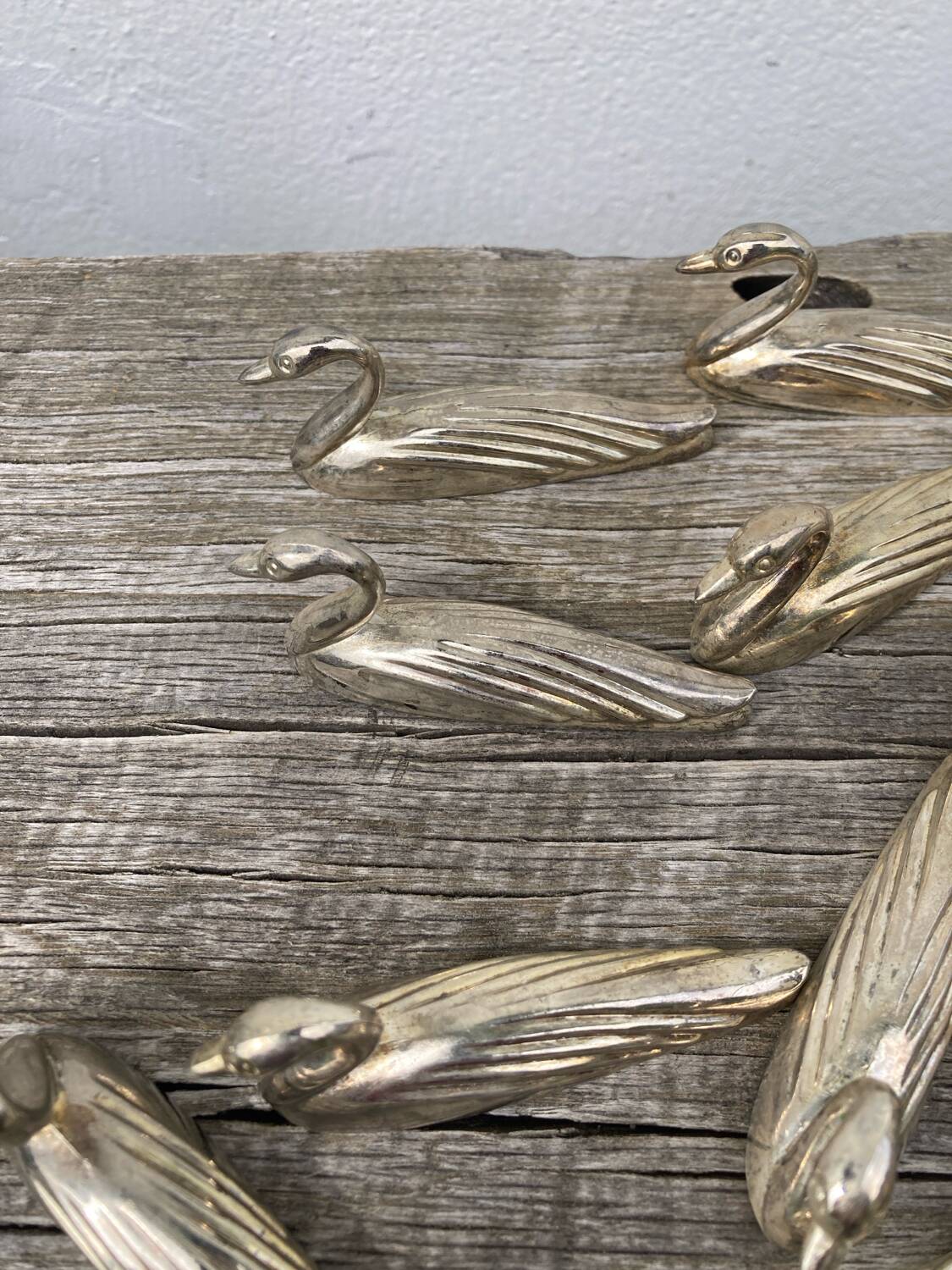 12 duck knife holders in silver metal