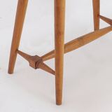 Vintage wooden side table with terracotta top