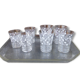Service a liquor composed of 7 glasses a geometric patterns and d a tray