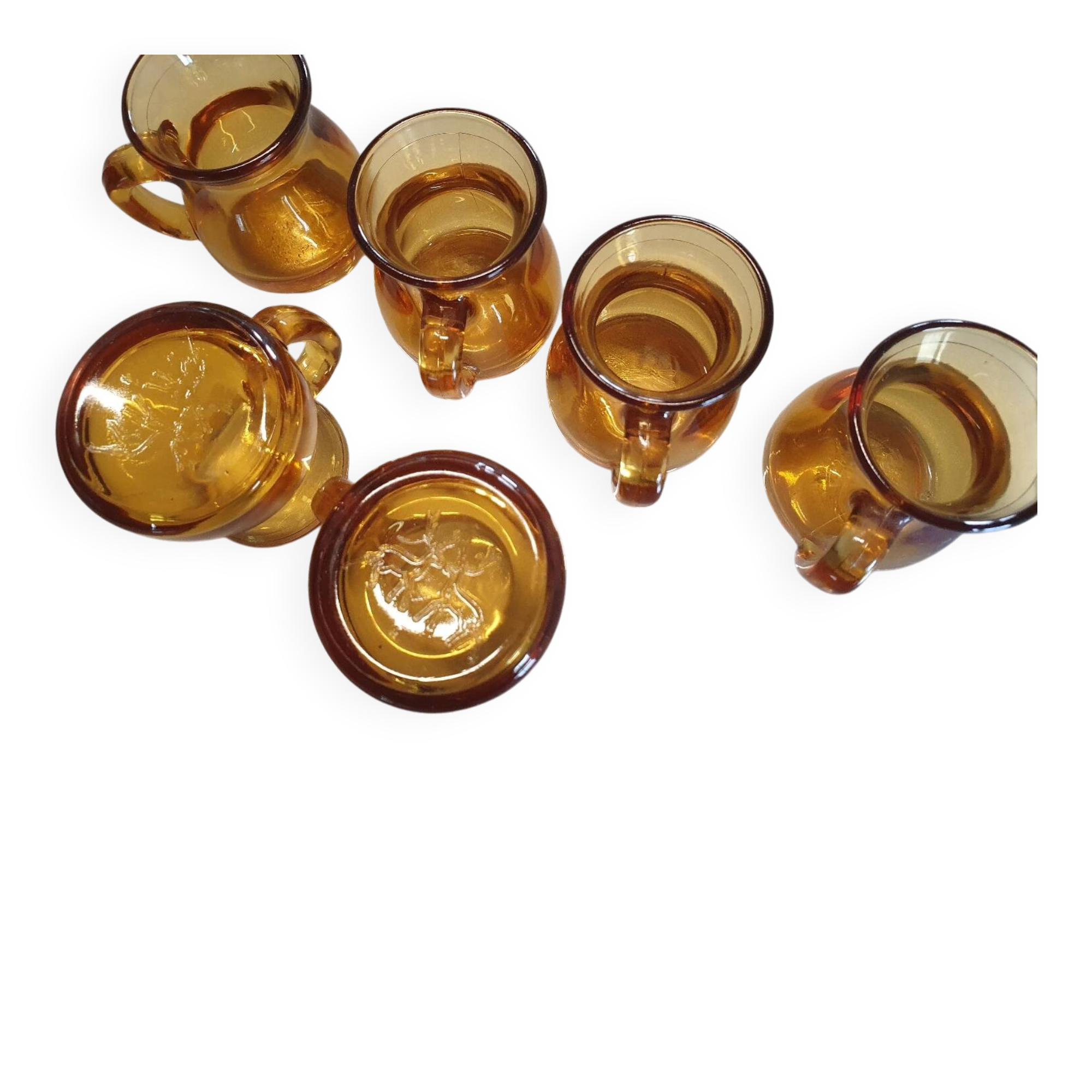 Set of original vintage small amber glass glasses.