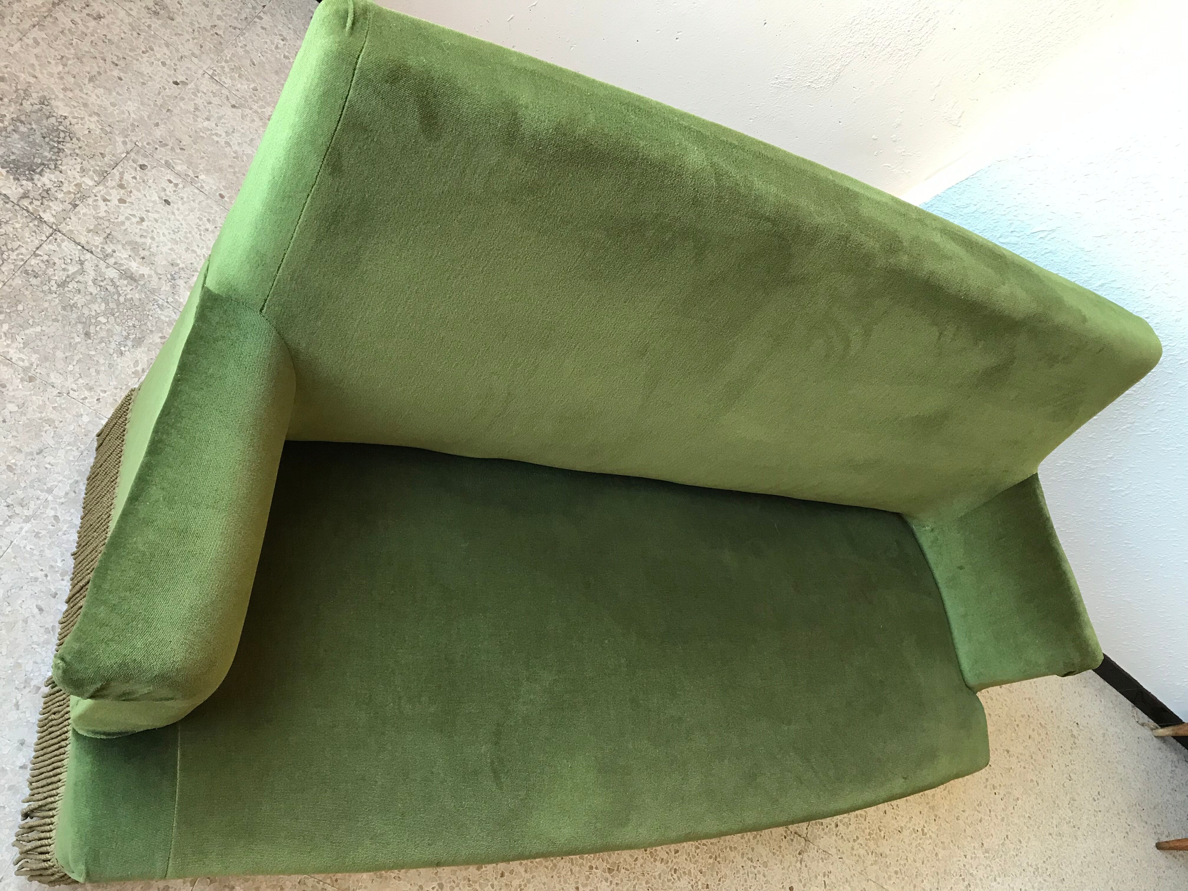 Vintage sofa in green velvet