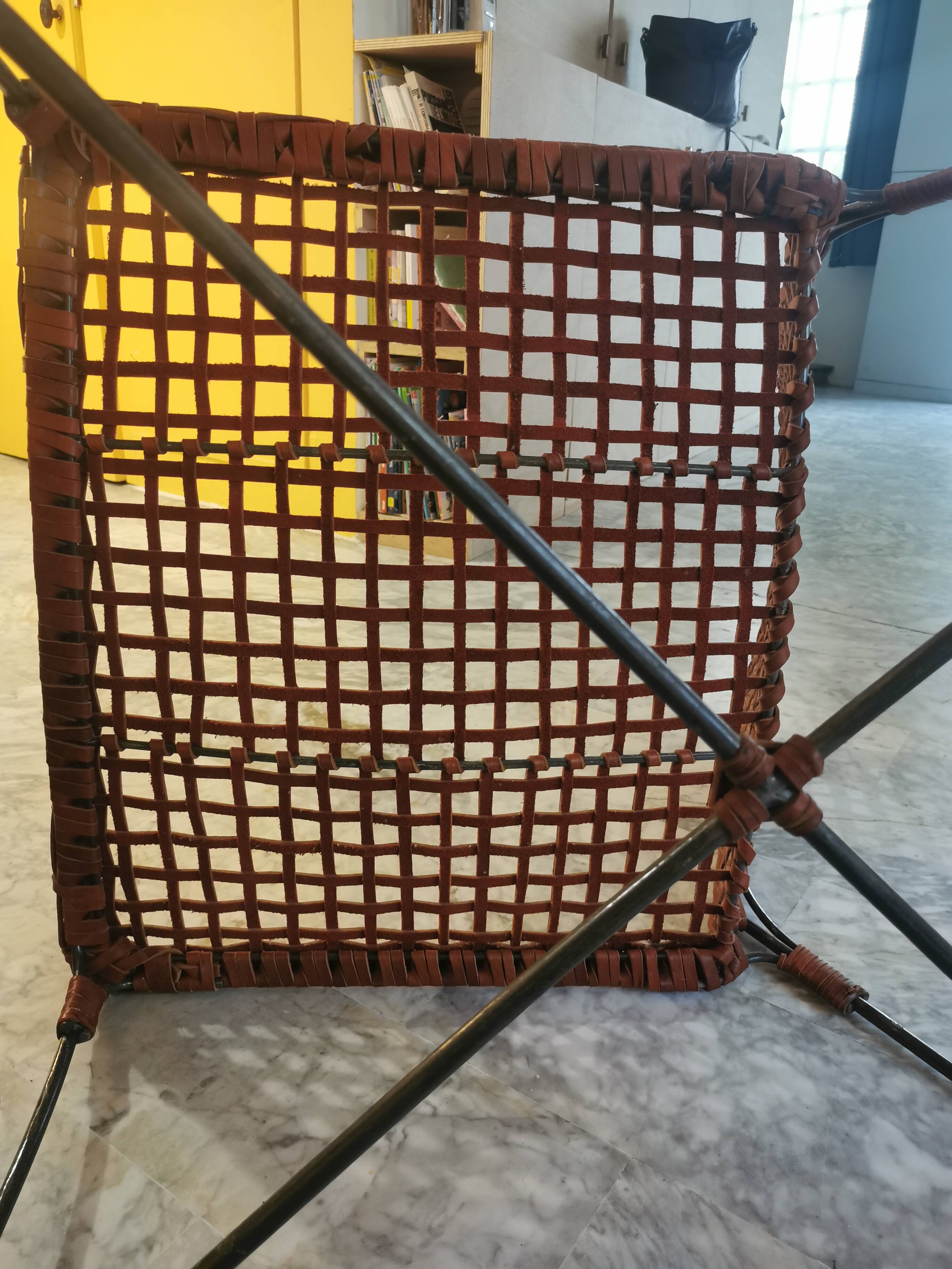 Modernist armchair in woven leather and black metal – 1960s–1970s