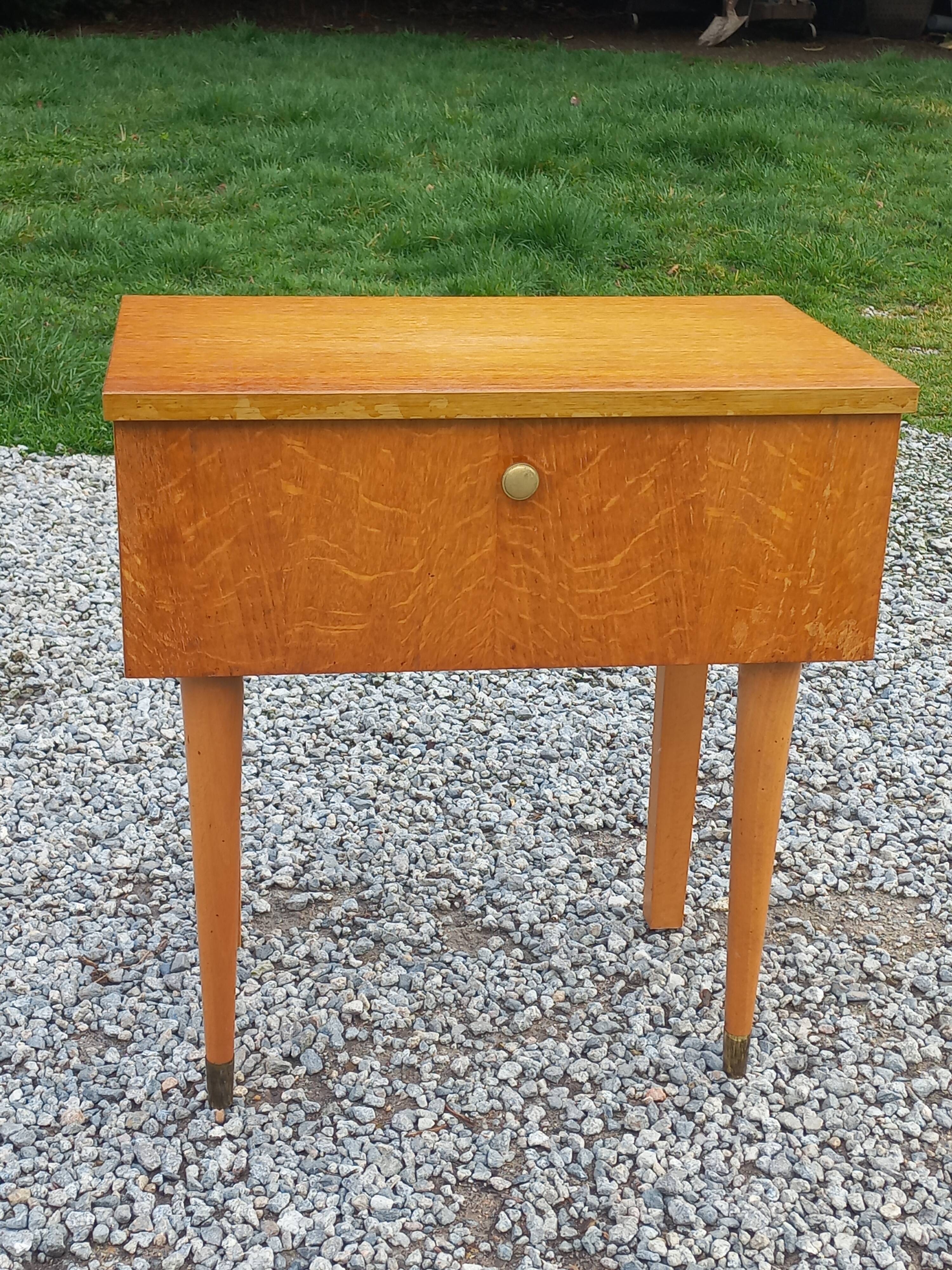 Vintage 1950s bedside table in blond oak with conical legs