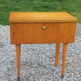 Vintage 1950s bedside table in blond oak with conical legs