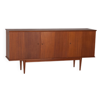 Scandinavian teak sideboard with 3 doors from the 1960s.