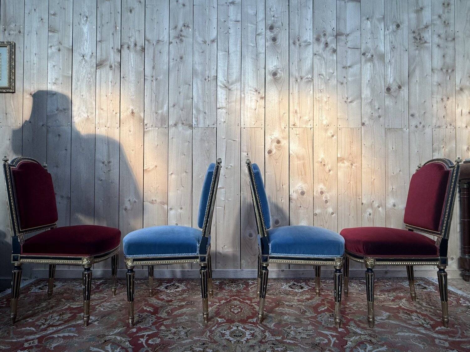 Set of 4 Napoleon III chairs in black and gold.