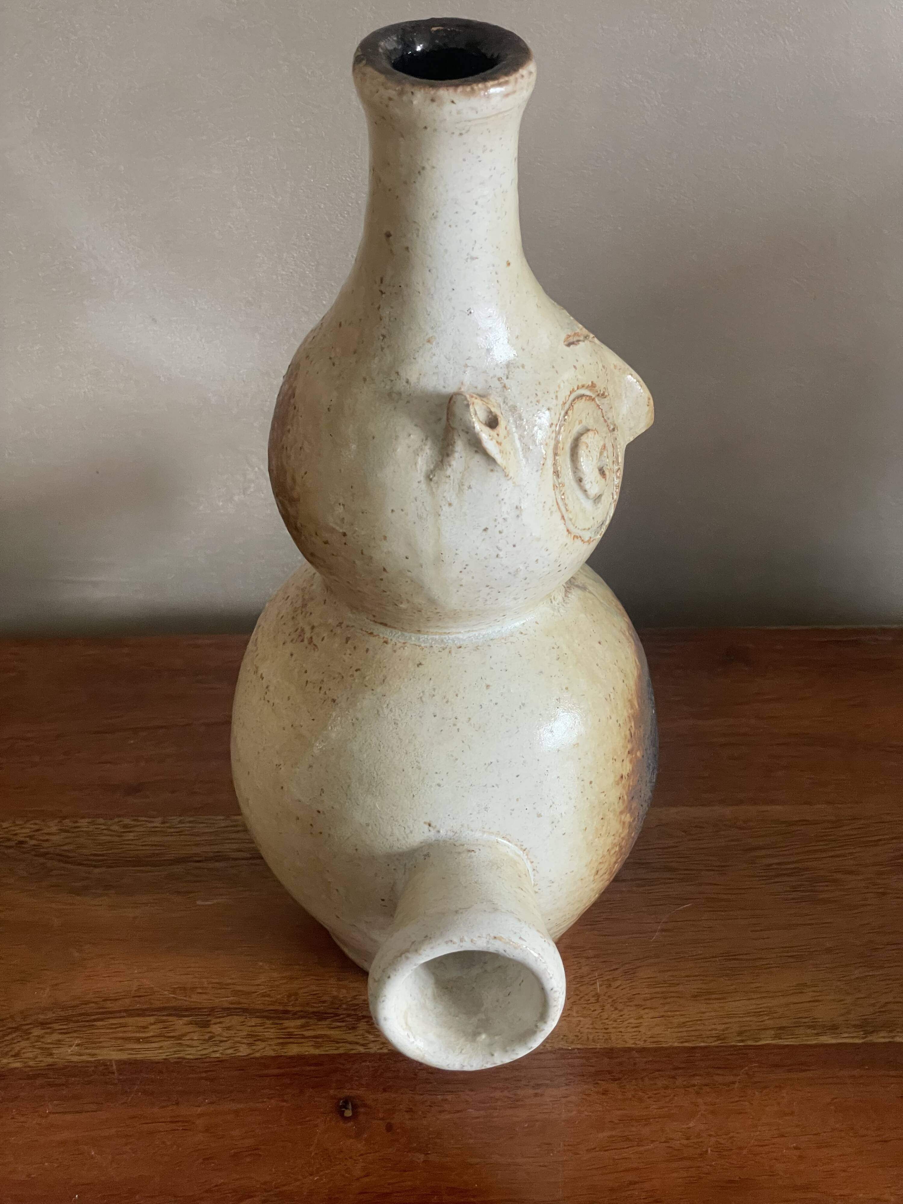 Zoomorphic owl base in sandstone