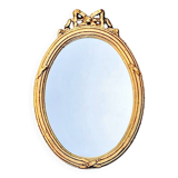 Antique oval wall mirror in gilded resin – Louis XVI knot –
