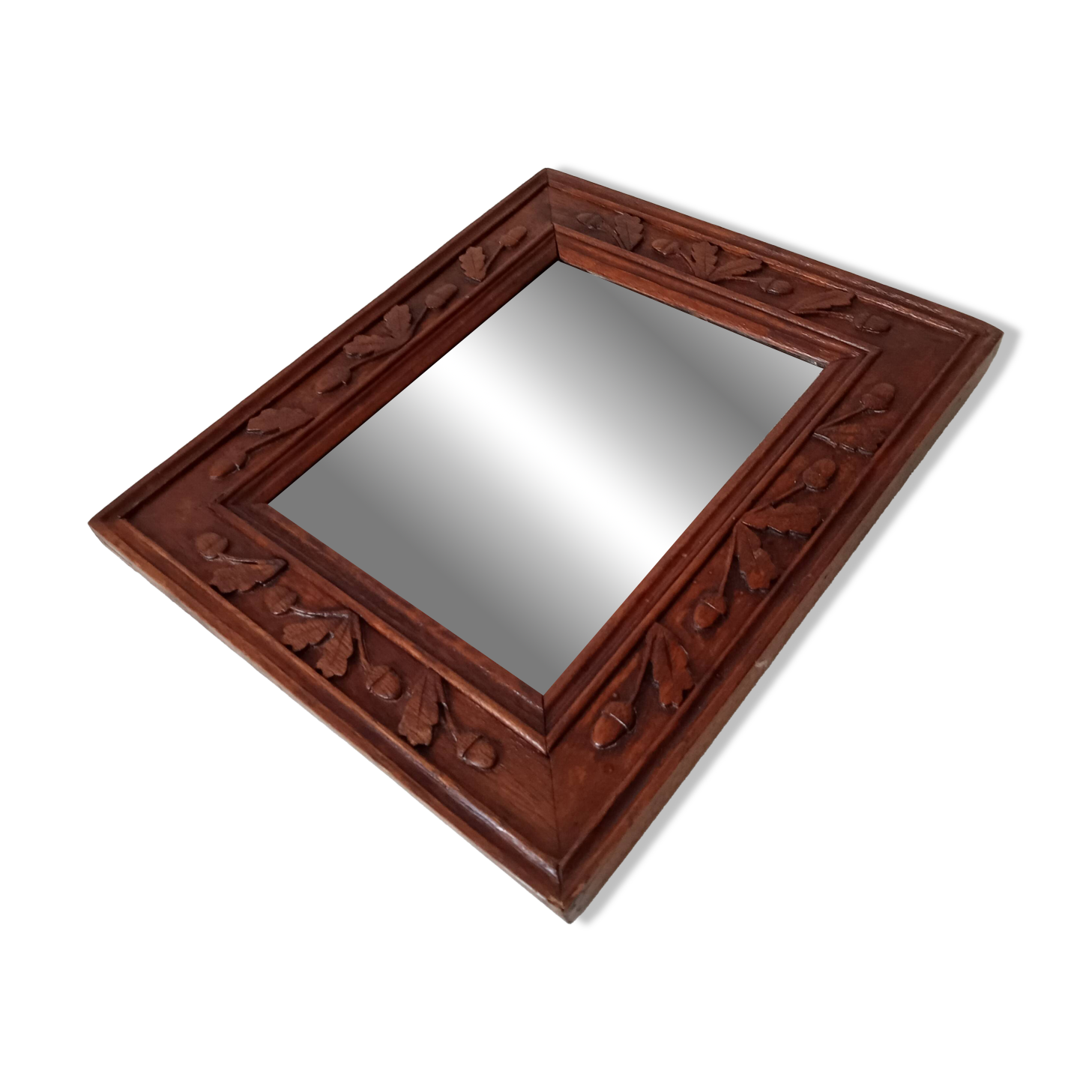 Antique mirror in carved wood