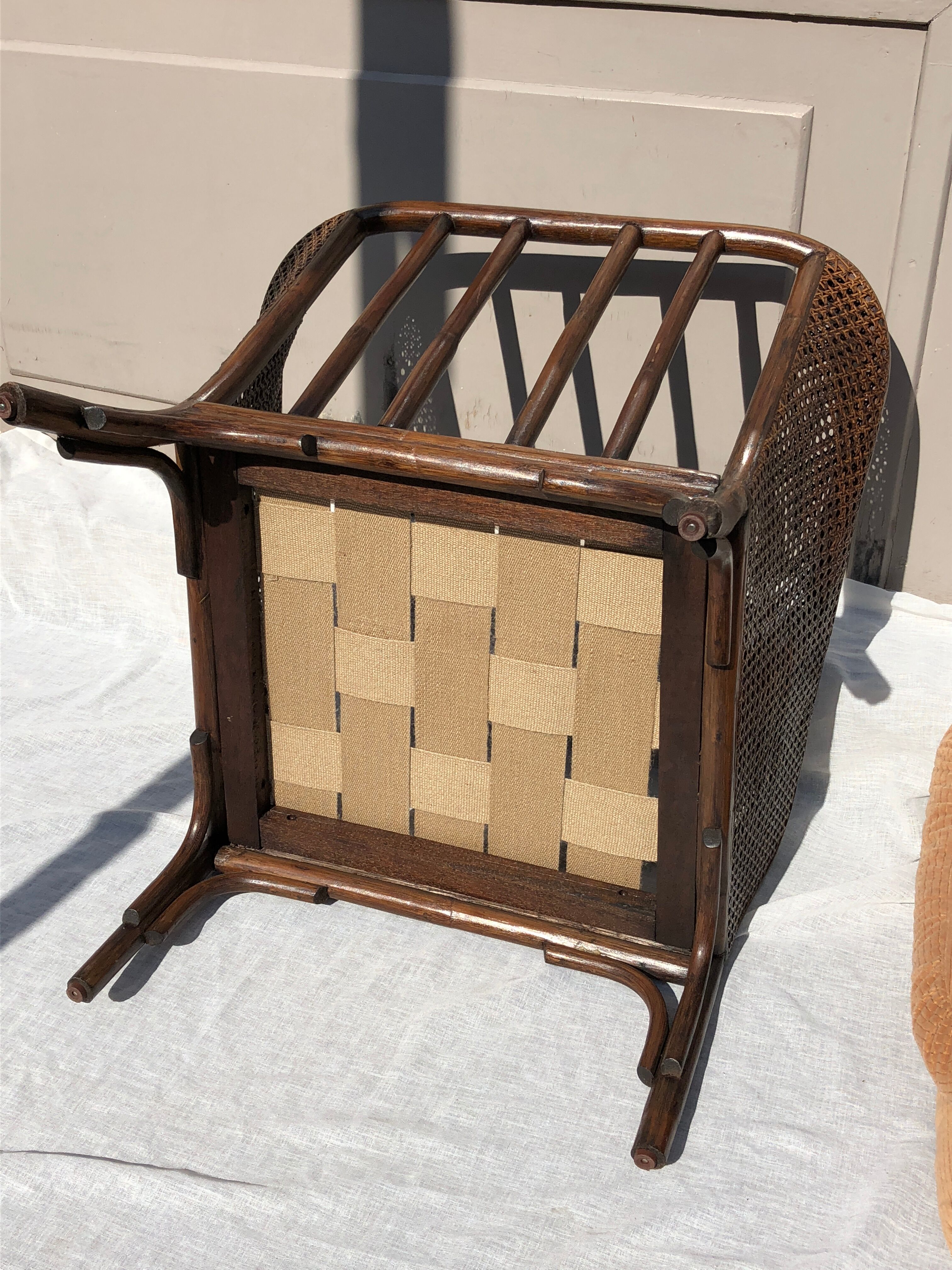 Rattan armchair and cane kok