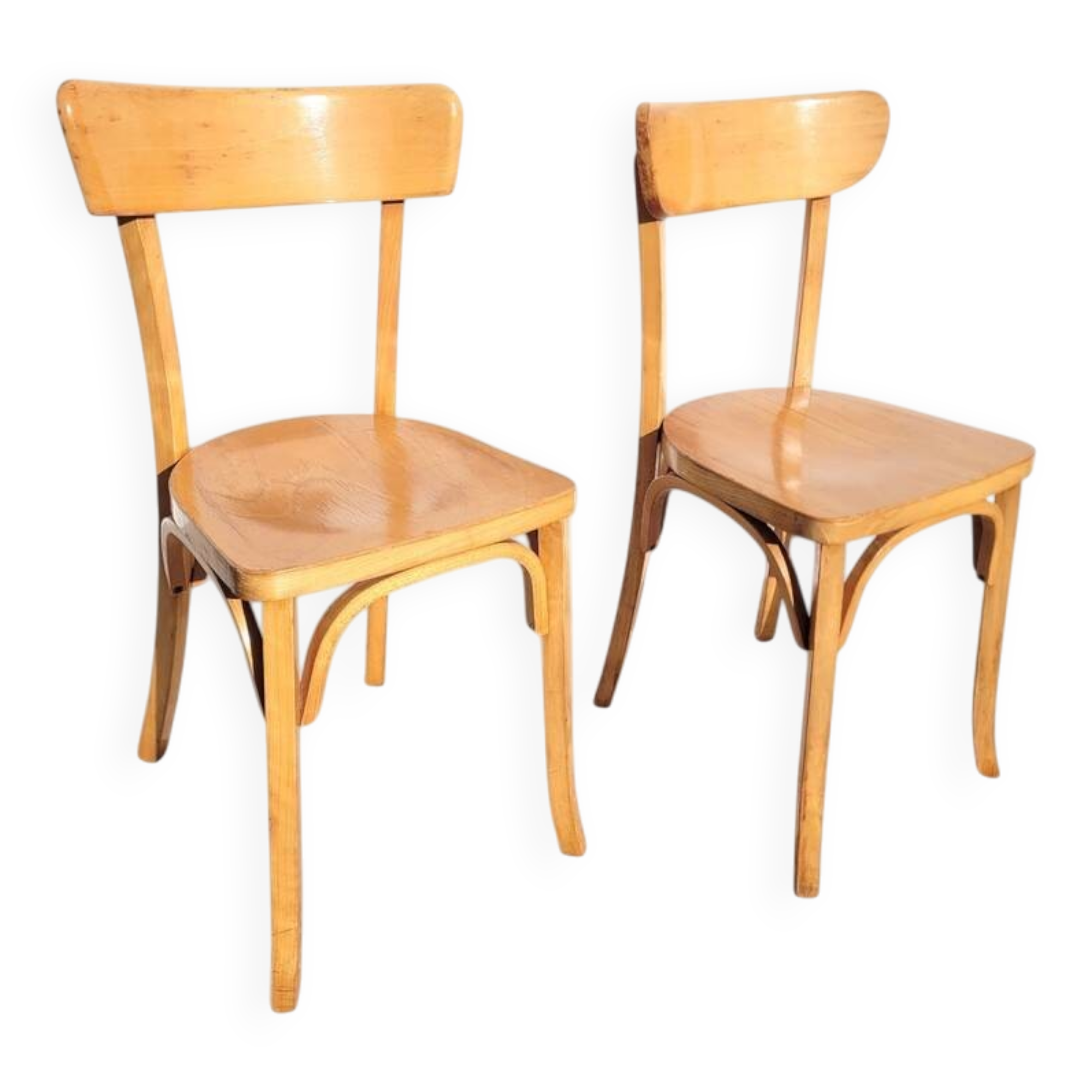 Pair of vintage bistro chairs in golden oak.