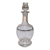 Blown glass decanter, engraved and chiselled. Made in France.