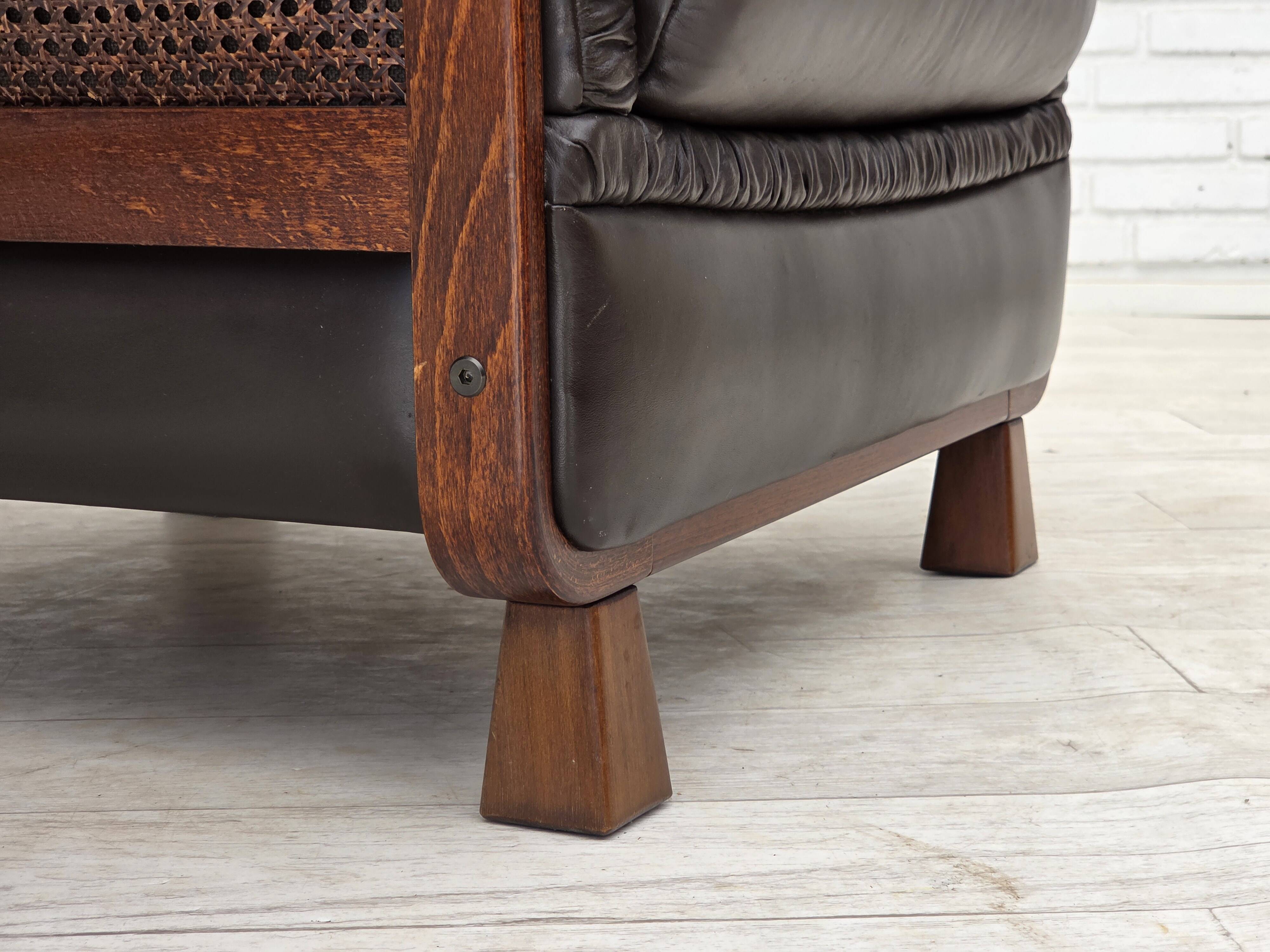 1970s, Scandinavian armchair, brown furniture leather, teak wood legs.