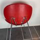 Red lounge chair in the style of Pierre Paulin 1980.