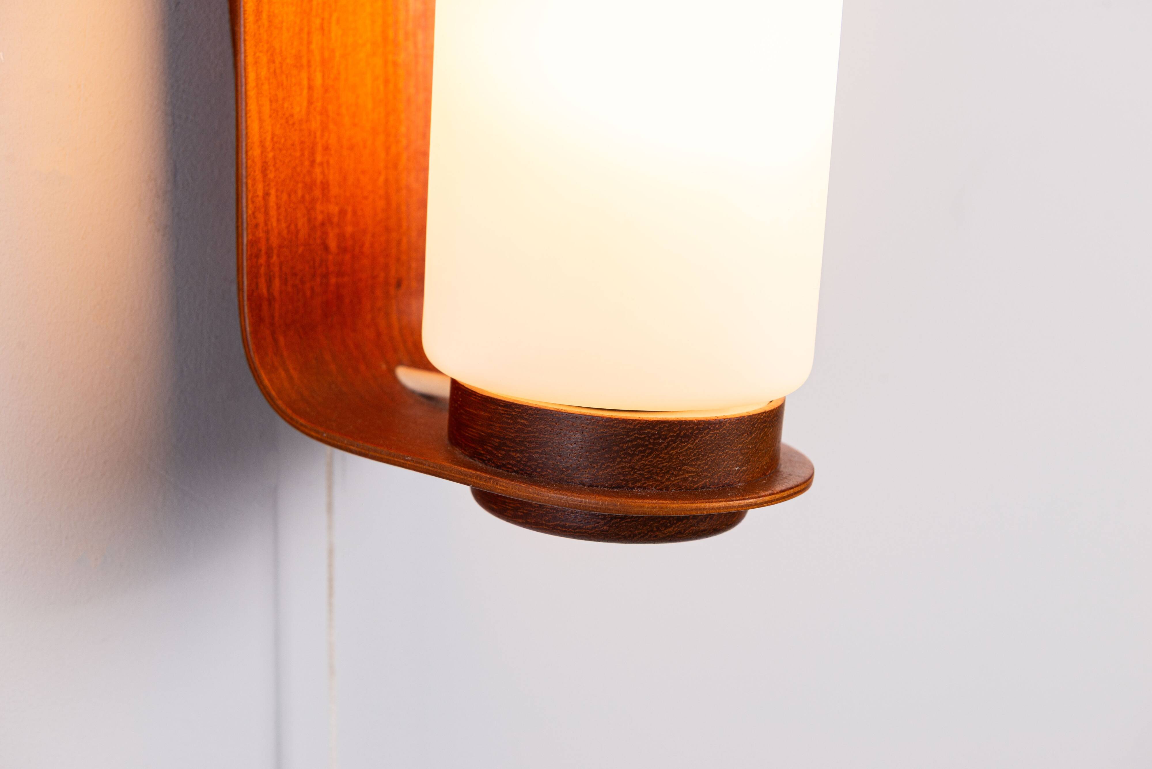Cilindrical opal glass and bent wood wall lamp