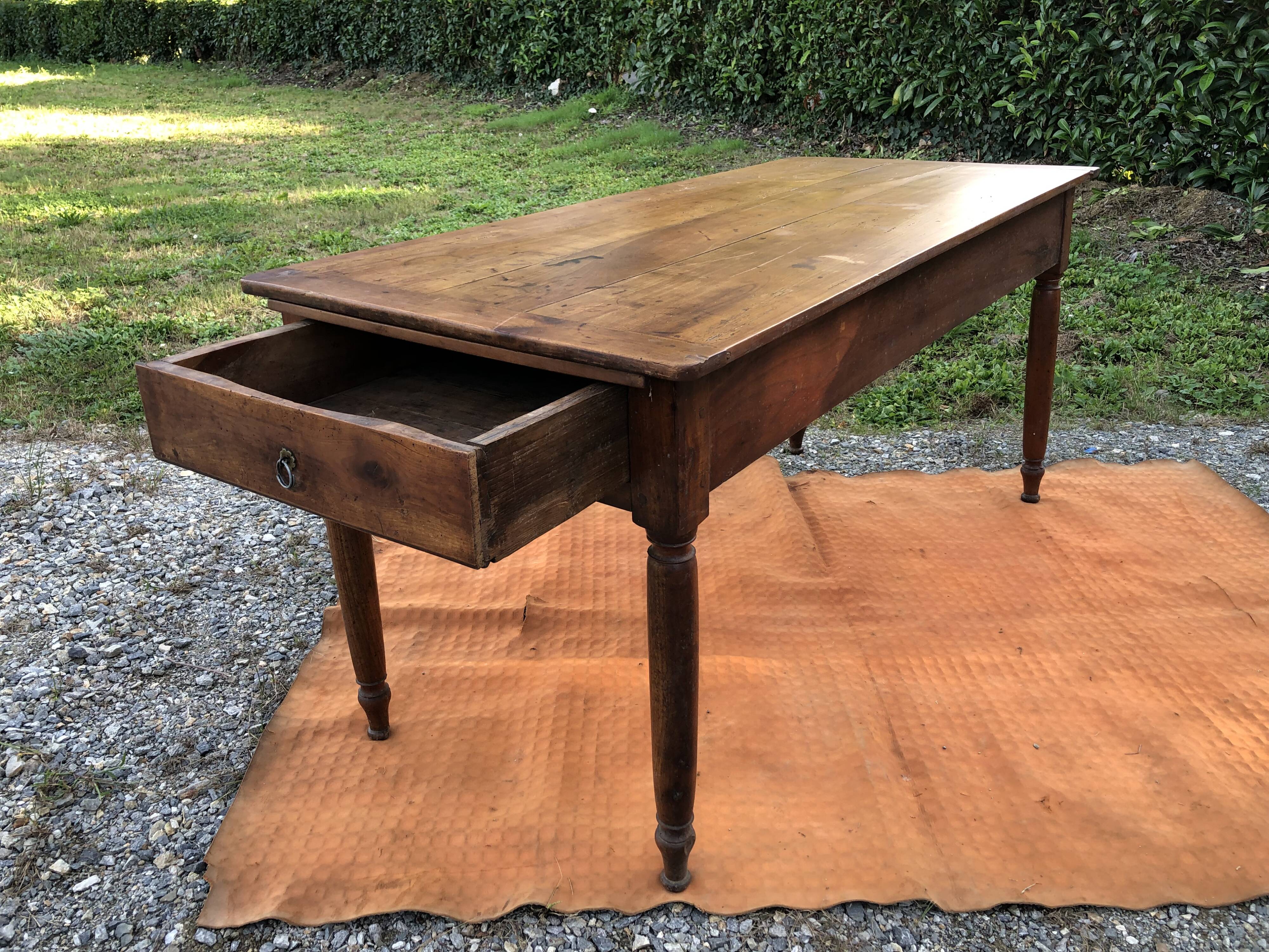 Antique cherry wood farm table with turned base with 2 drawers and 1 pull