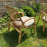 Vintage 1970s rattan armchair pair