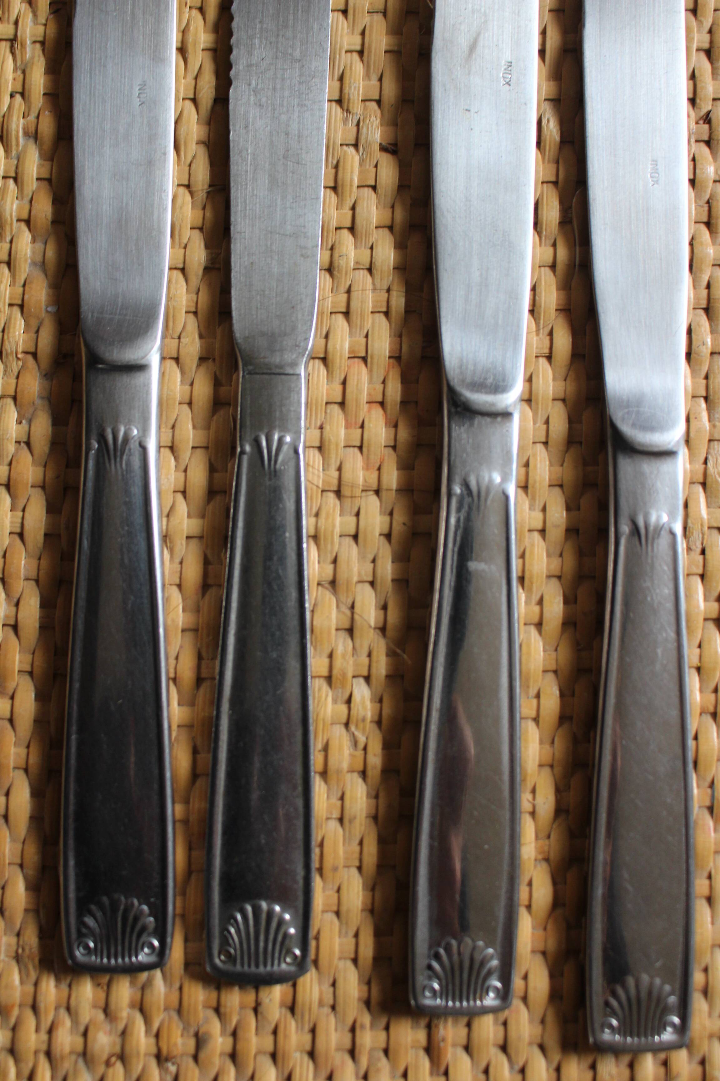 Mismatched set of 8 forks + 8 vintage shell stainless steel knives