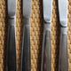 Mismatched set of 8 forks + 8 vintage shell stainless steel knives