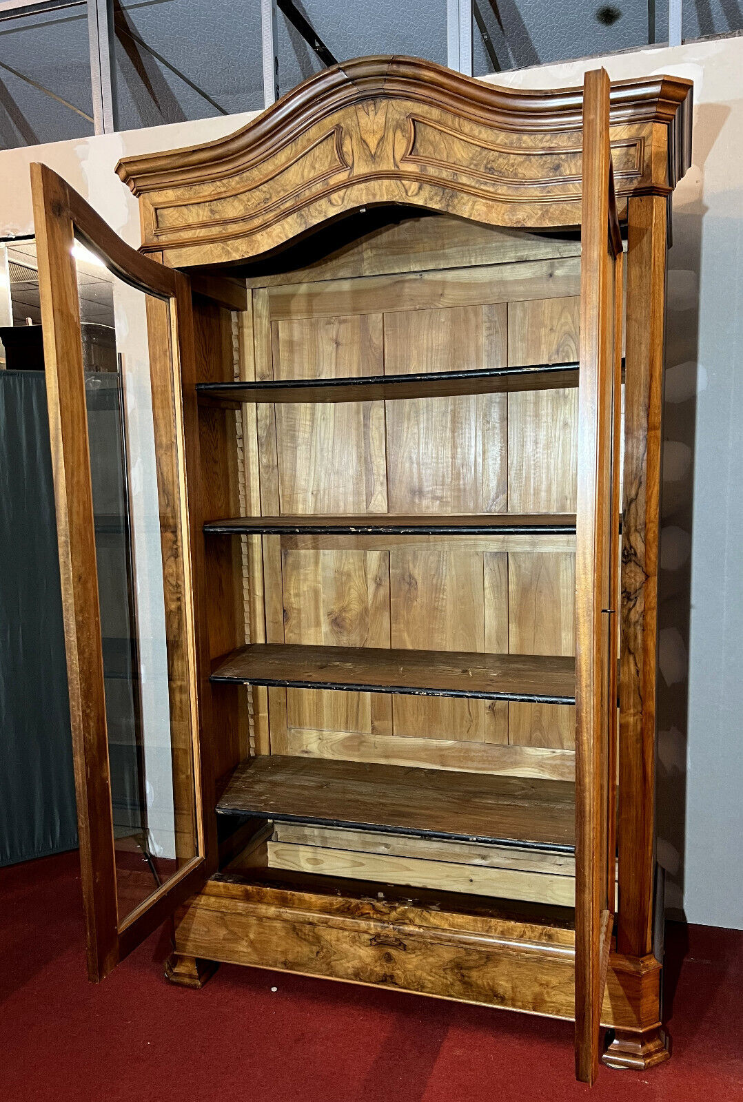Library with gendarme's hat Louis Philippe era in blond walnut around 1830