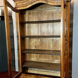 Library with gendarme's hat Louis Philippe era in blond walnut around 1830