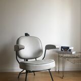 Vintage hairdresser's armchair with helmet transformed into a lamp